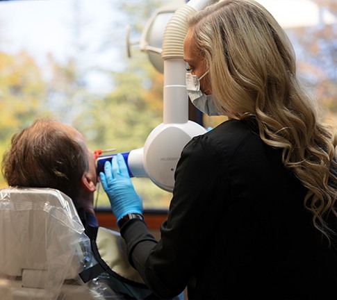 Dental team member capturing digital x-rays