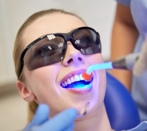 Patient receiving cosmetic dental bonding treatment