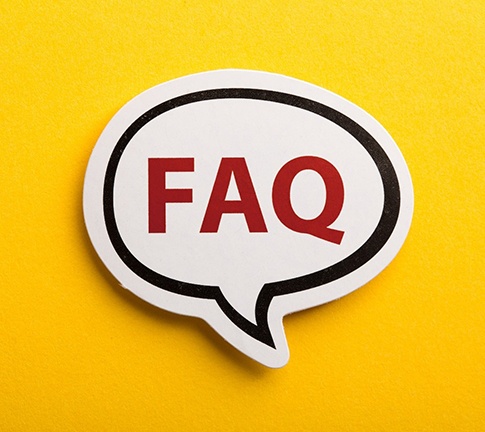 White word bubble with FAQ on yellow background