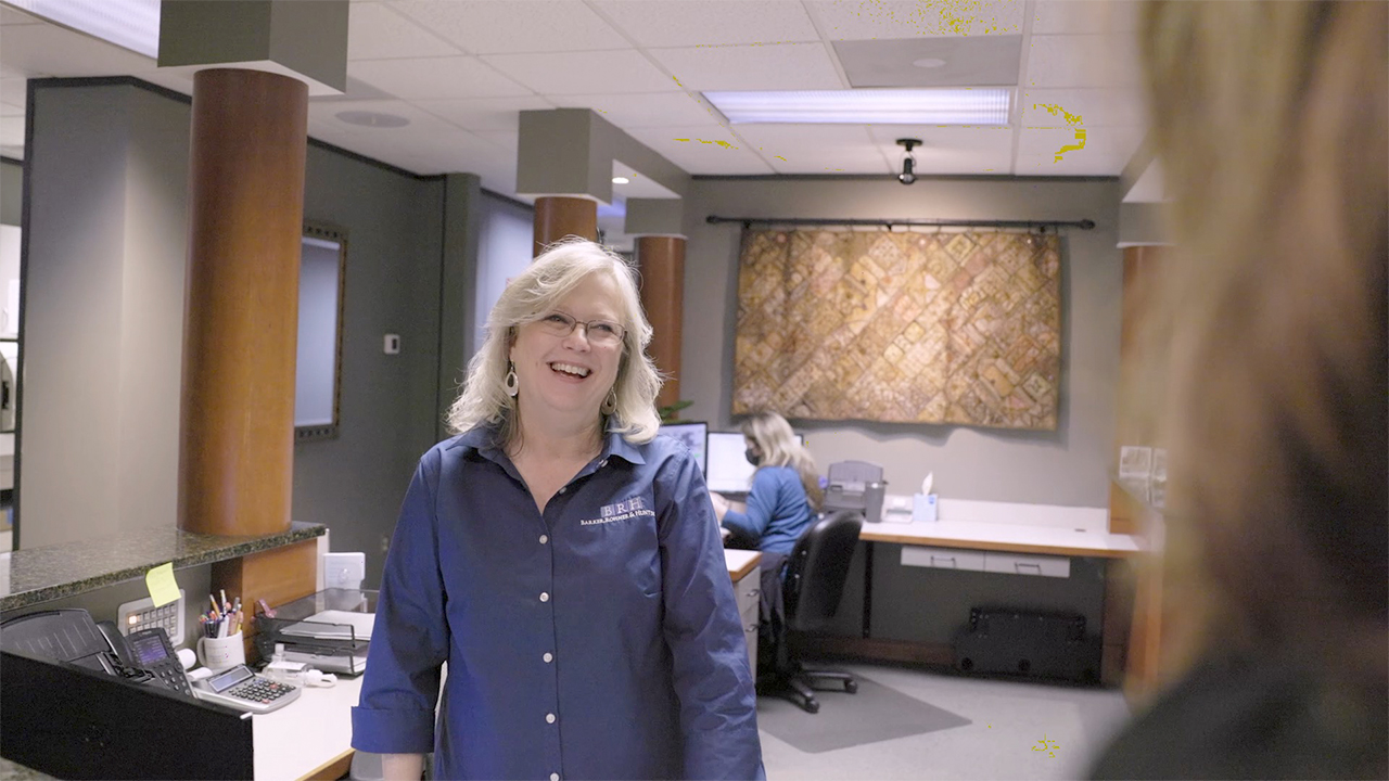 Raleigh dental team member smiling at a patient