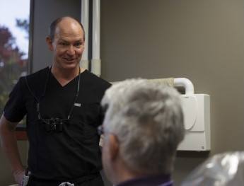 man smiling after receiving care in Austin