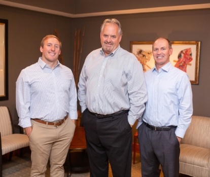 doctor hunt doctor barker and doctor rohner smiling togteher in Raleigh