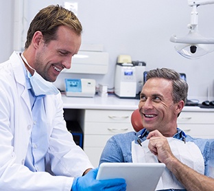 Man smiling at dentist