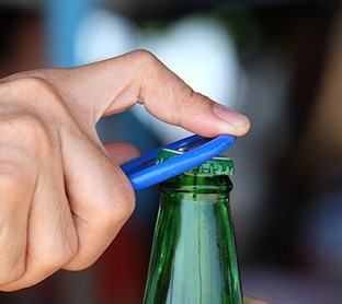 Man opening bottle