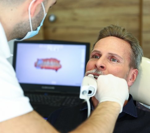 Dentist using digital impression system