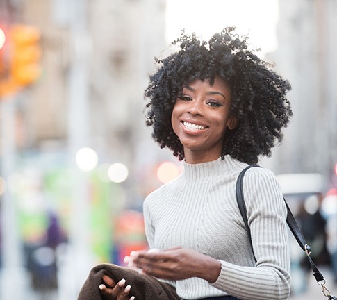 a woman in Raleigh smiling with veneers