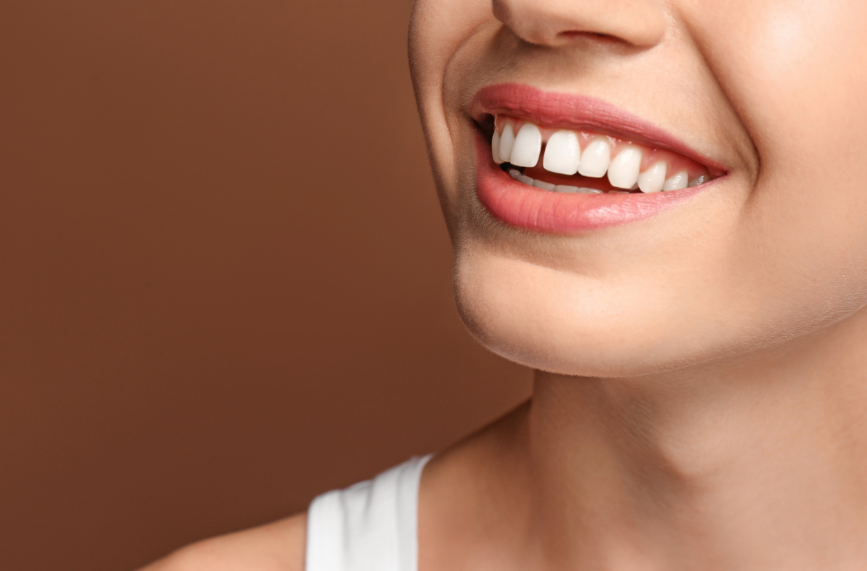 Woman with gap between teeth smilng